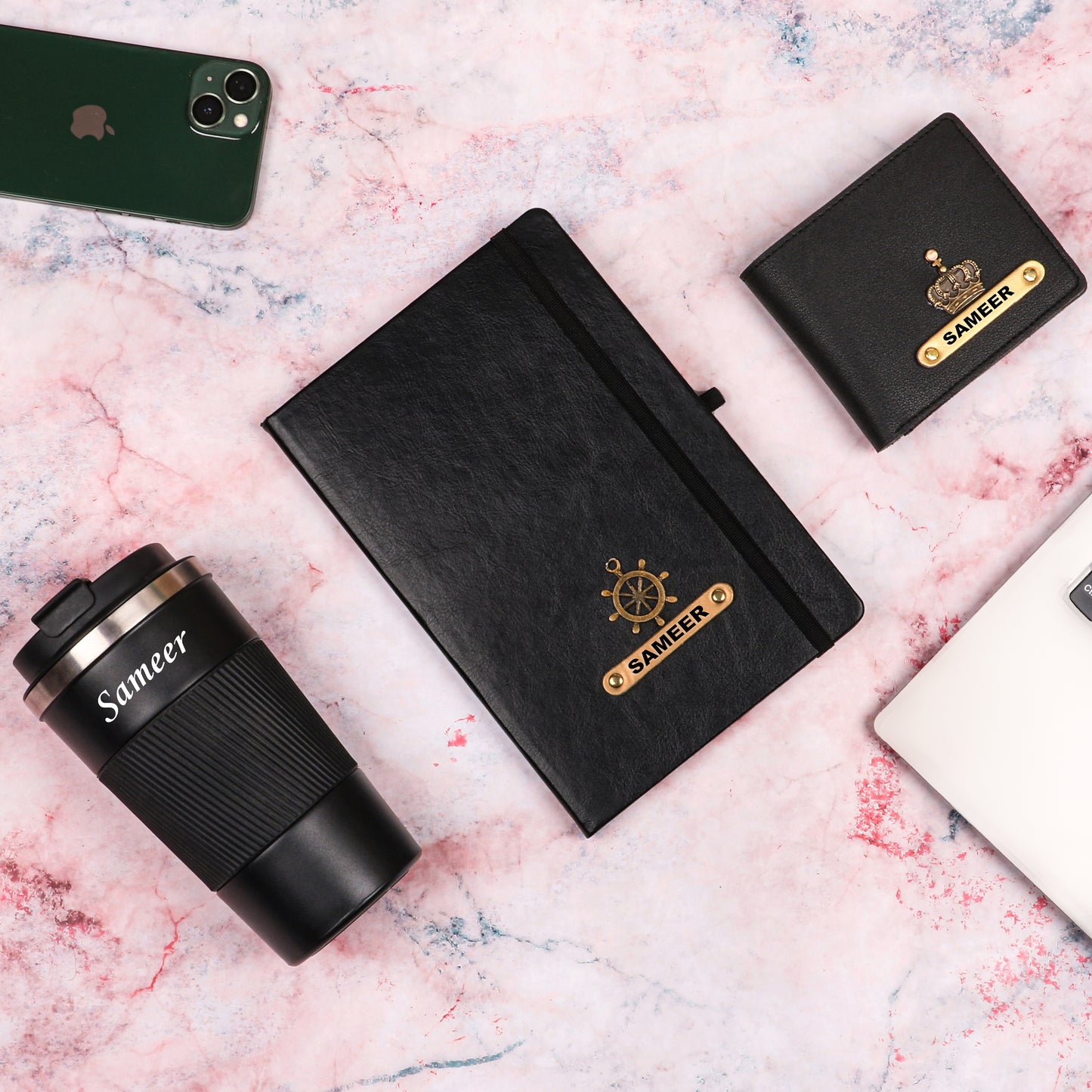 Black tumbler with dairy and wallet