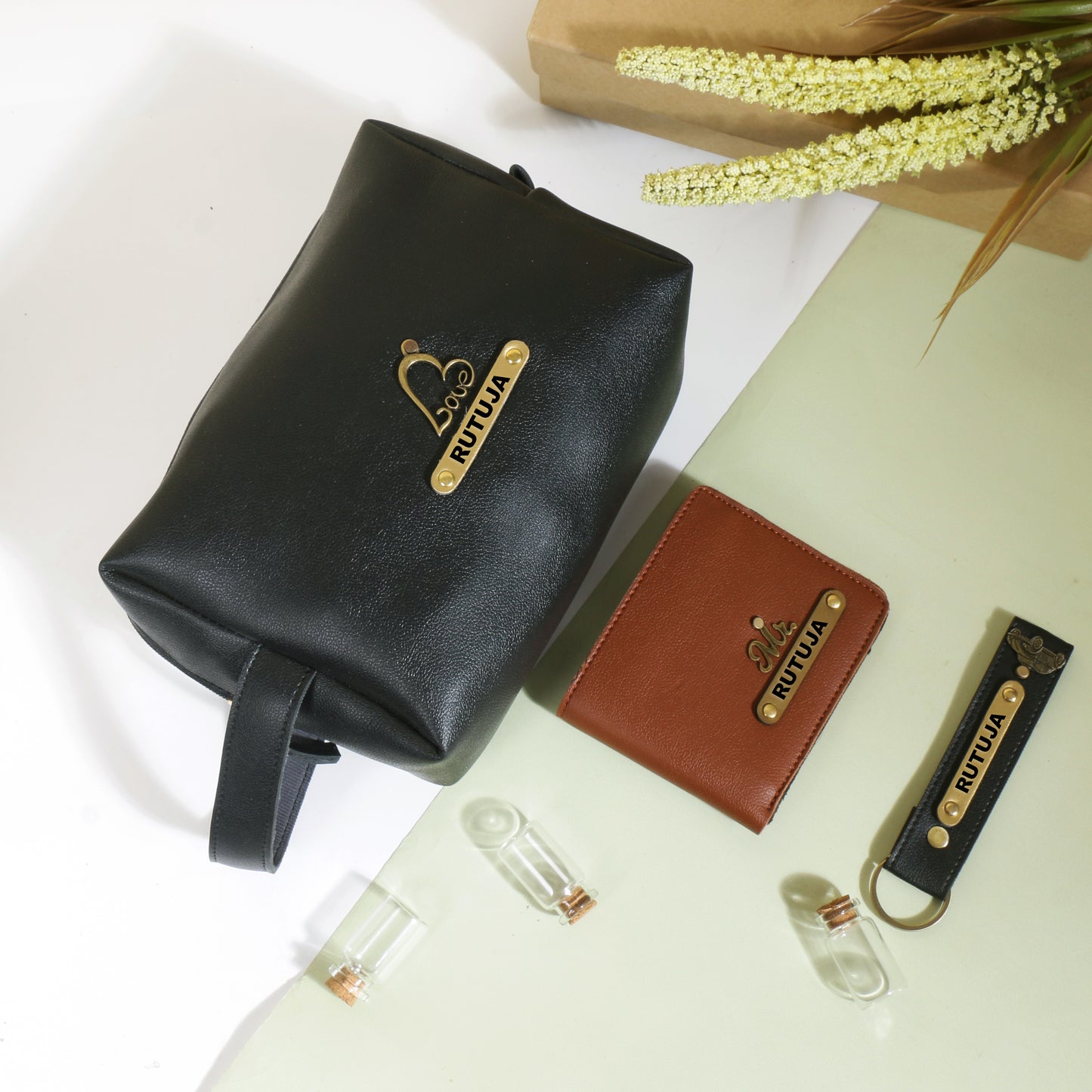 Black pouch and keychain with tan mens wallet