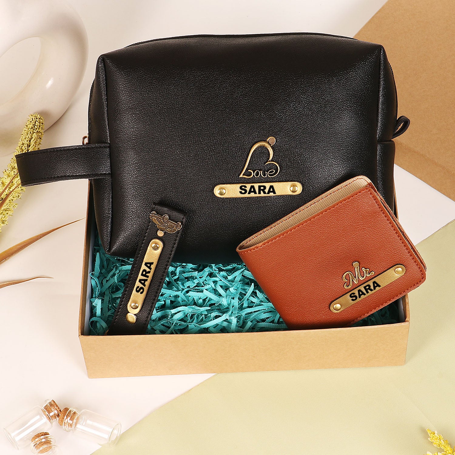 Black pouch and keychain with tan mens wallet